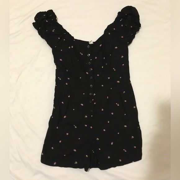 bp Pants - BP Black romper with purple flowers and ruffle sleeves